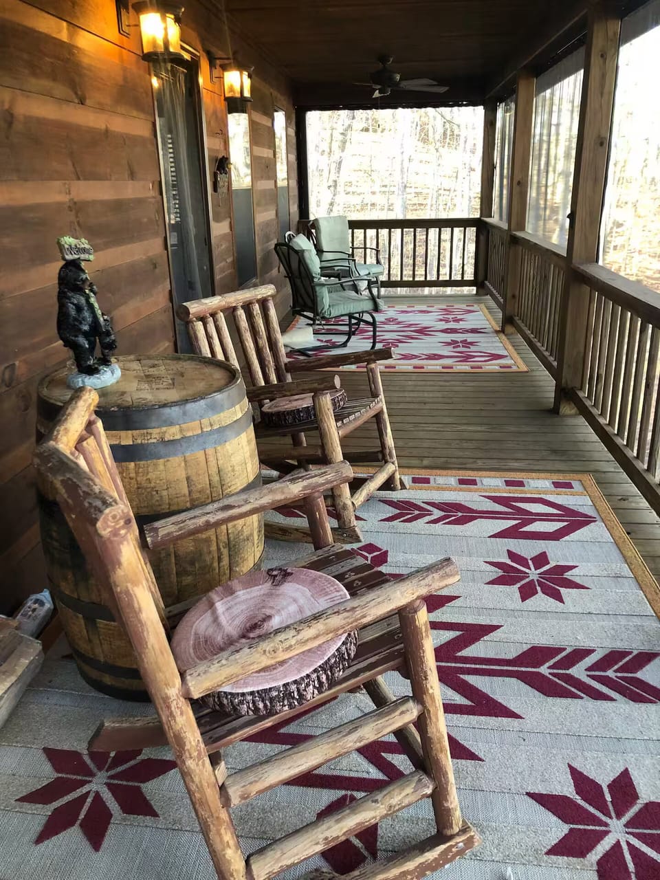 Screened in porch with a lot of seating space