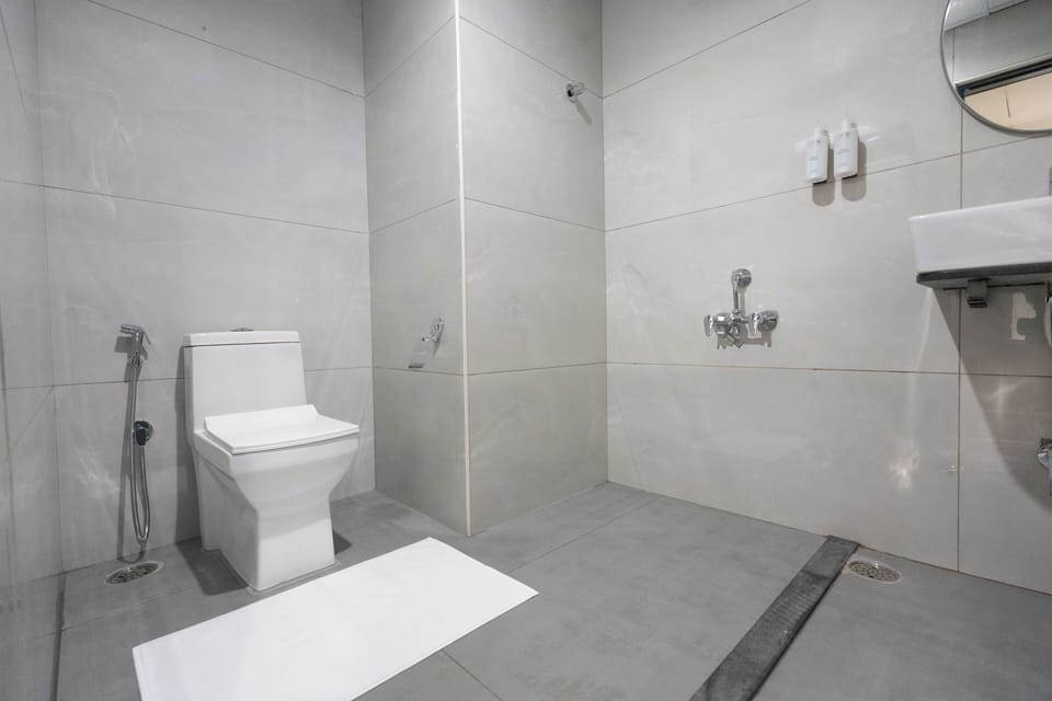 Shower, free toiletries, slippers, soap