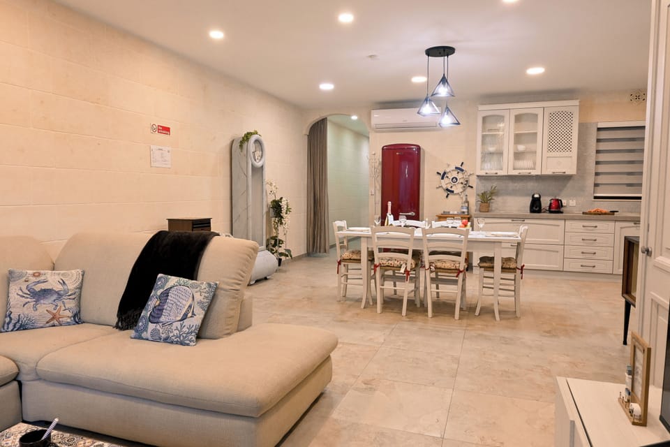 Family Apartment, Multiple Bedrooms (Valley Mist Apart NB 1 Xlendi Gozo) | Living area | 21-inch TV with digital channels