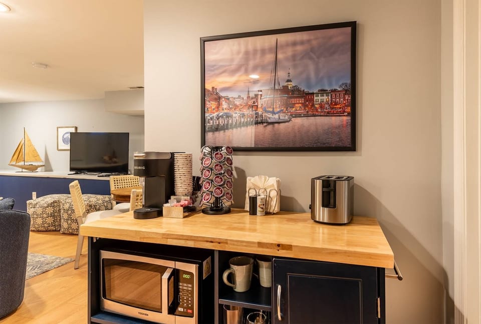 The kitchenette includes a microwave, Keurig (with starter coffees/creamers), toaster and refrigerator.