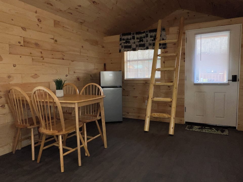 The dinette with refrigerator.