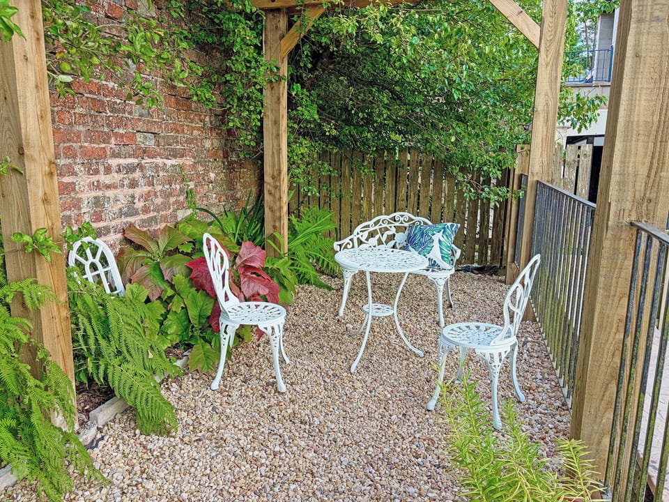 Seating in pergola to enjoy the evening sun | 2 The Langhouse, Inverkip, near Greenock