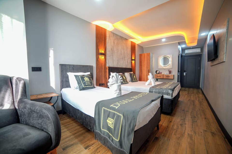 Family Triple Room, City View | Frette Italian sheets, premium bedding, down comforters