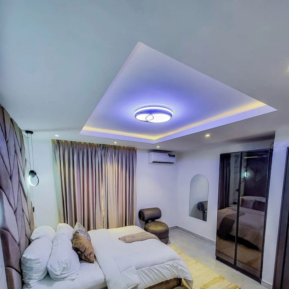 Family Apartment, Balcony, City View | Desk, laptop workspace, blackout drapes, soundproofing