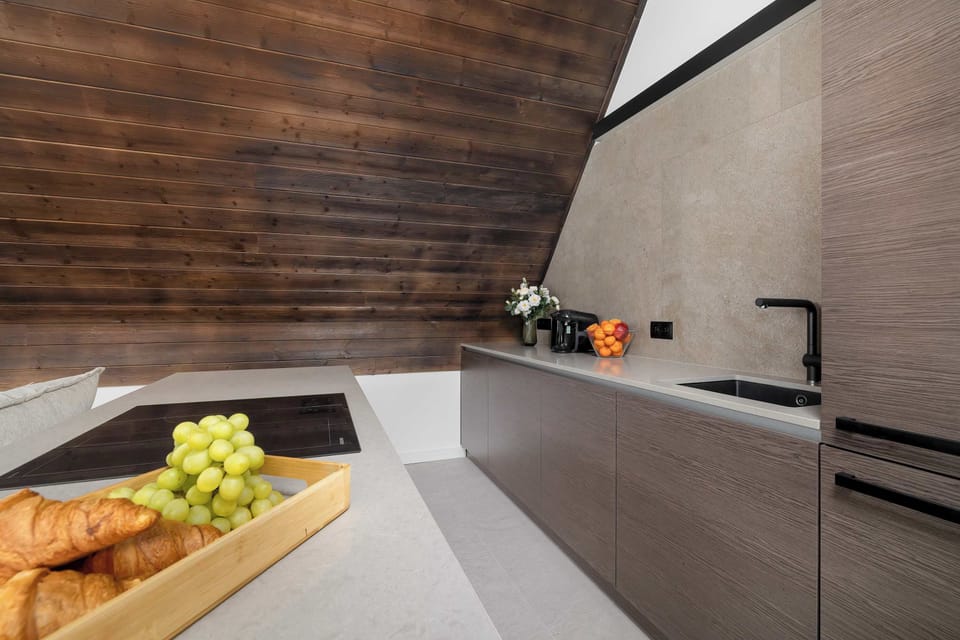 The kitchenette's practical layout maximizes space and functionality.