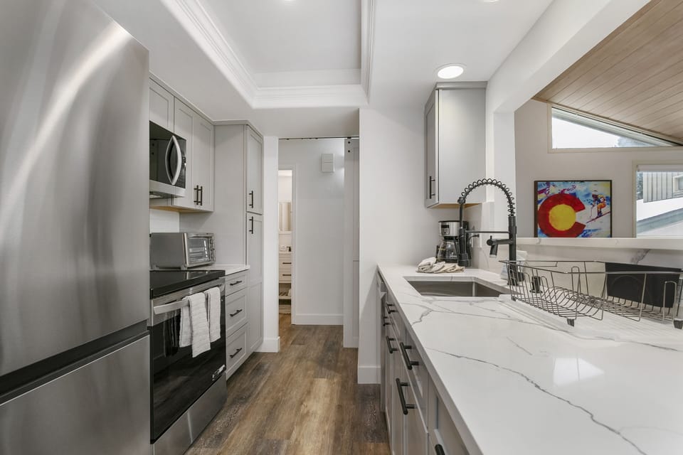 Condo, 3 Bedrooms | Private kitchen | Coffee/tea maker, fridge, oven, toaster