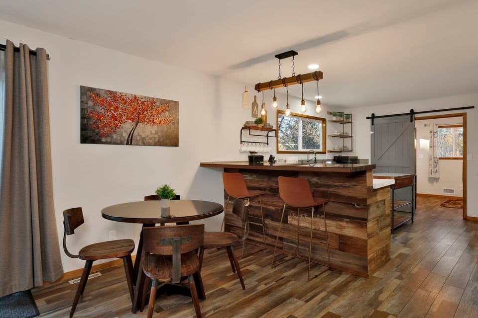 Inviting dining area designed for comfort and connection. The space feels open and airy, with a warm atmosphere that makes everyday meals and special gatherings equally enjoyable.