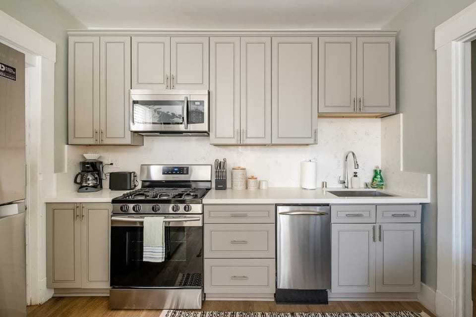 The contemporary, streamlined kitchen comes fully equipped for your stay