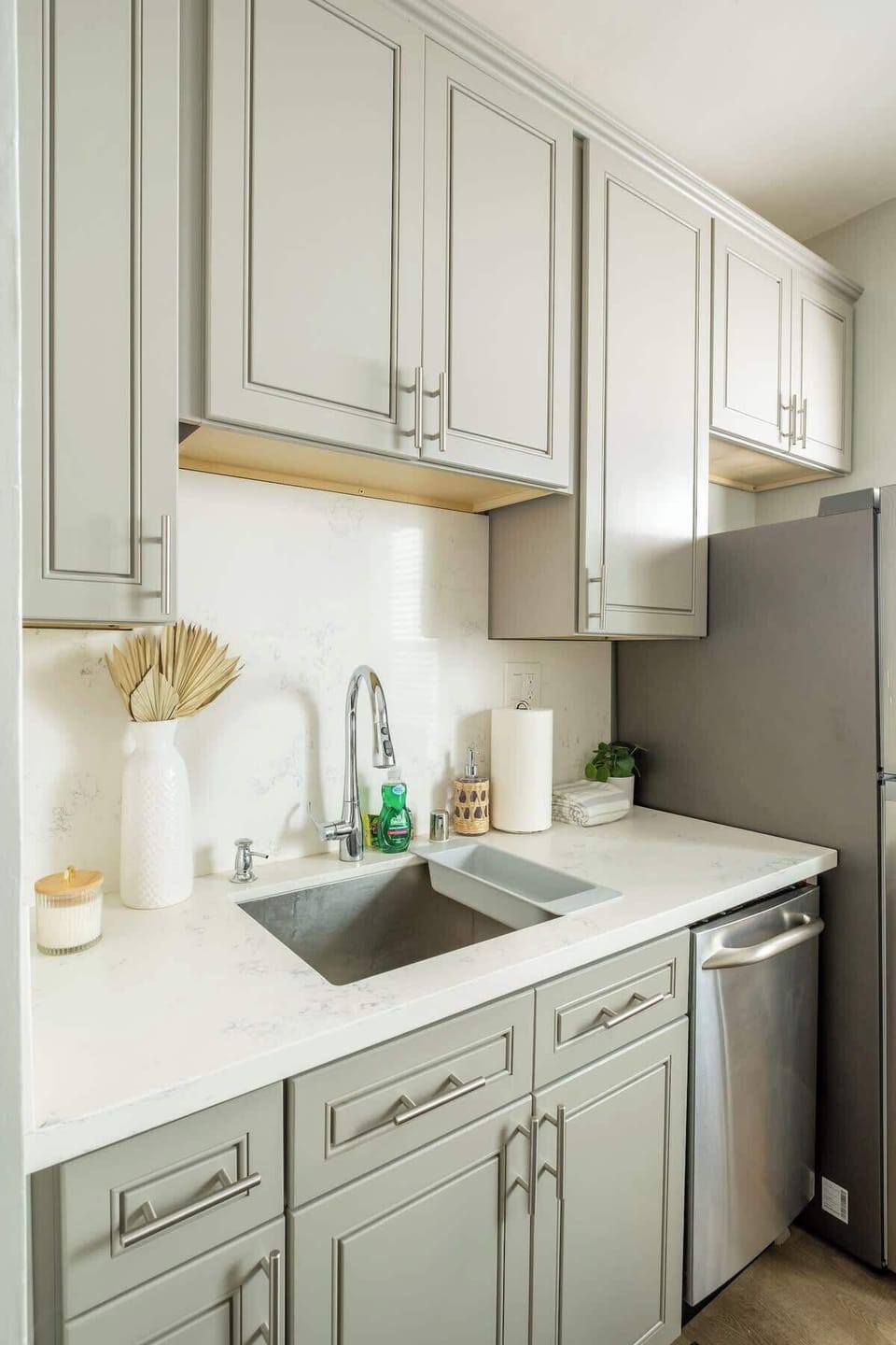 The kitchen features high-end fittings and quality stainless steel appliances