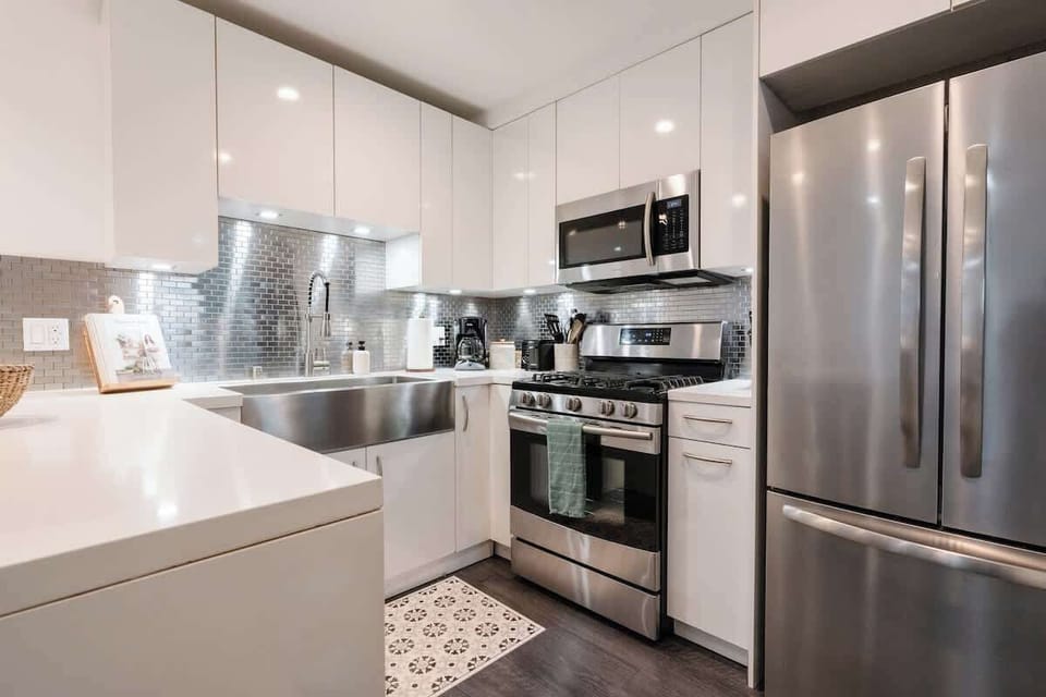 The sparkling, gourmet kitchen comes fully equipped with everything you need