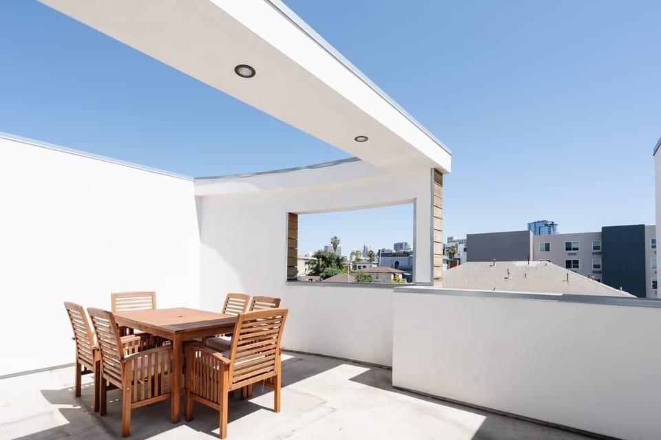 Enjoy views out over Little Italy from the private rooftop patio