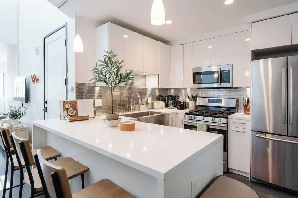 Step through into the glamorous, modern kitchen 