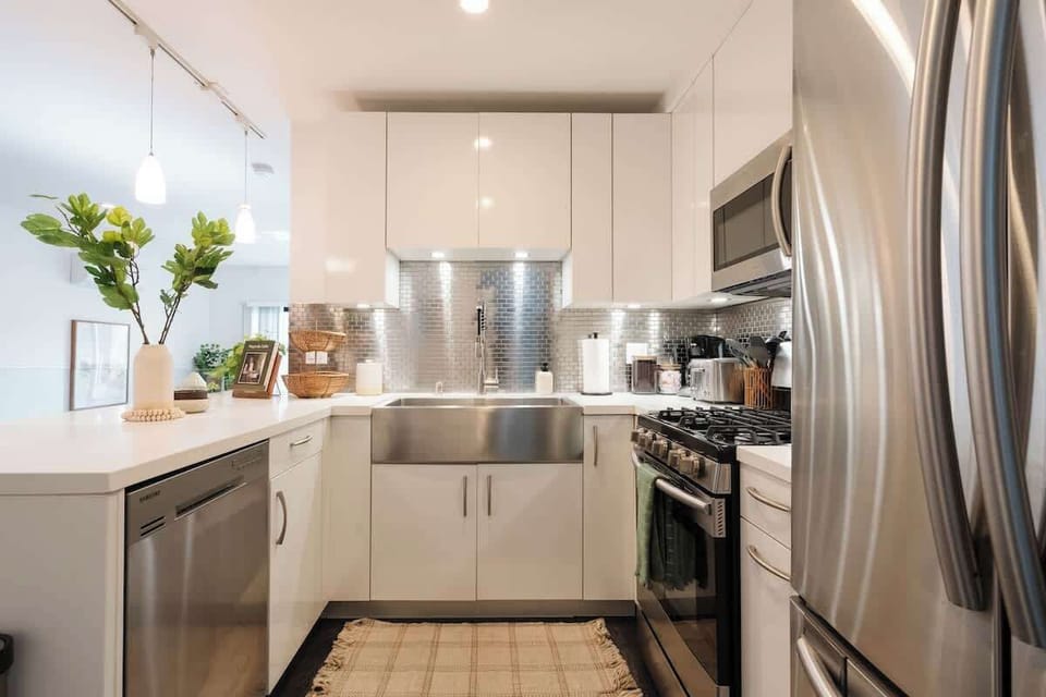 The sparkling, gourmet kitchen comes fully equipped with everything you need