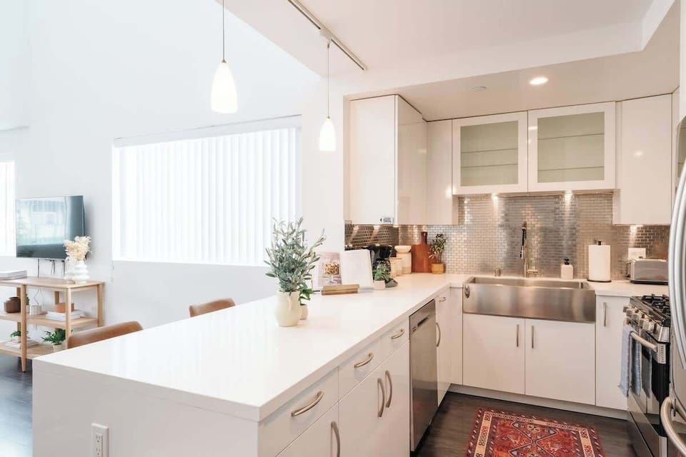 The shimmering kitchen comes fully equipped with everything you could need
