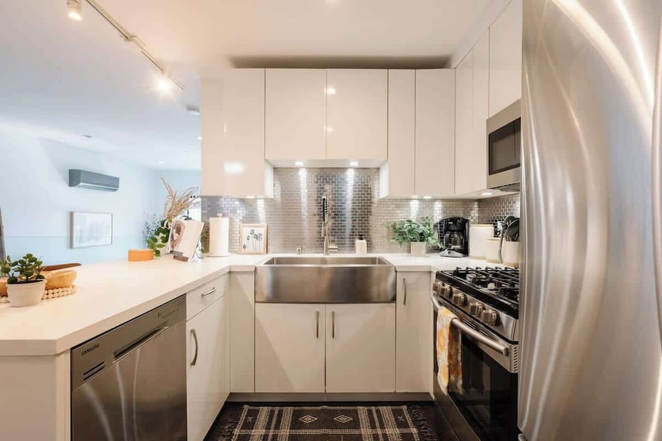 The sparkling, gourmet kitchen comes fully equipped with everything you need