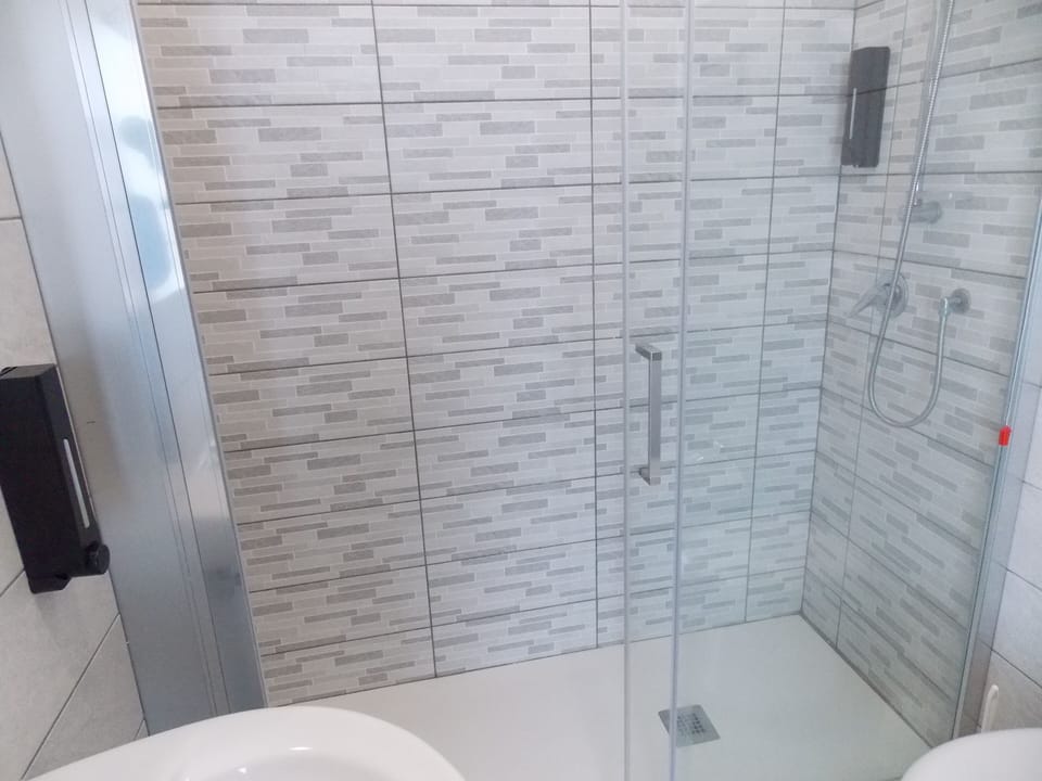 Deluxe Triple Room, Balcony, Sea View | Bathroom | Hair dryer, bidet, towels, soap