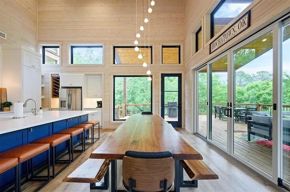 Dining Room: Bright and airy space with views, perfect for gatherings over delicious meals!