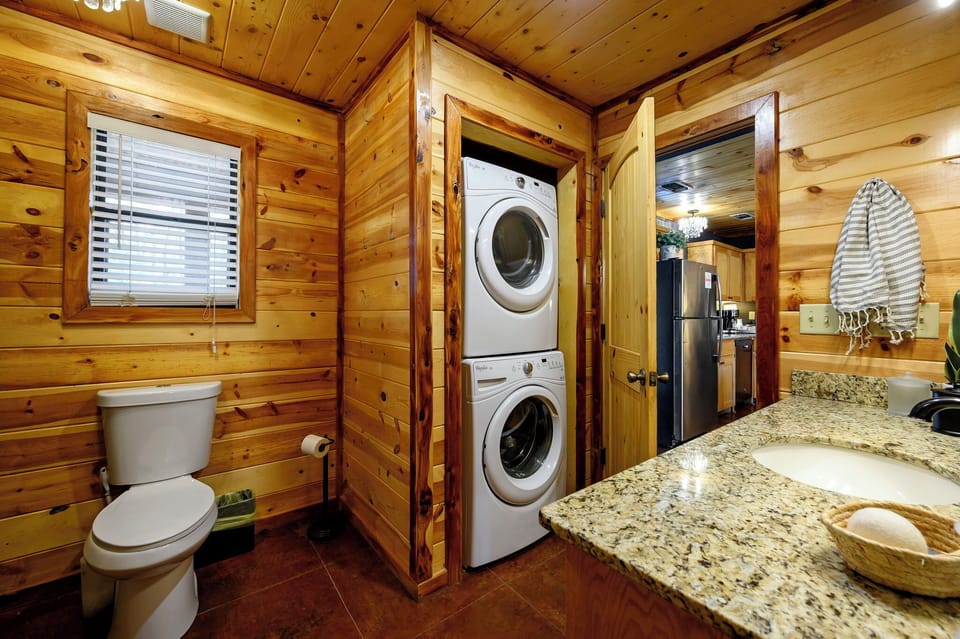 Dedicated restroom space with full laundry access, giving you everyday ease while enjoying a mountain retreat.