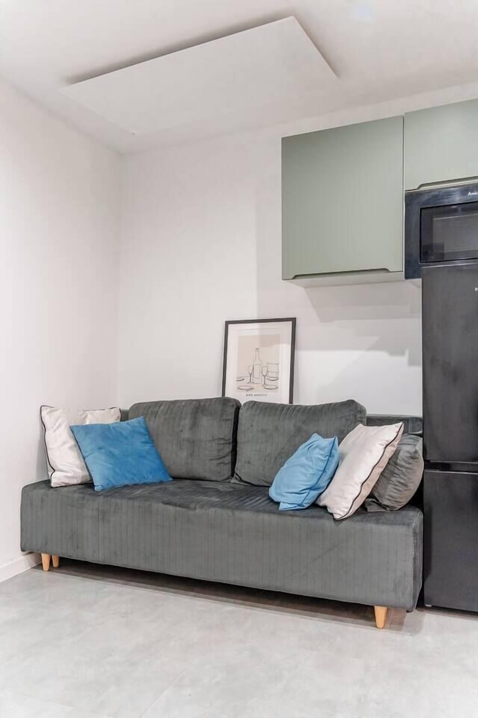Living Area with Sofa Bed and Dining Table | Book Now with RENTUJEMY.COM