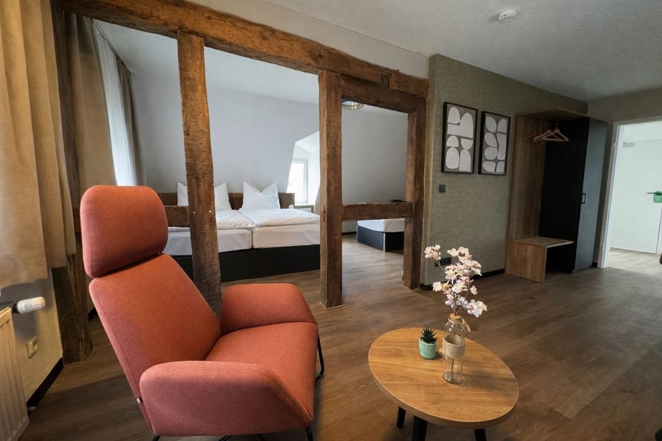 Deluxe Suite, Courtyard View | Desk, laptop workspace, free WiFi