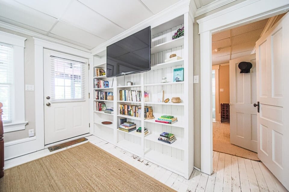 King bedroom has an exterior door leading to the back enclosed patio deck.