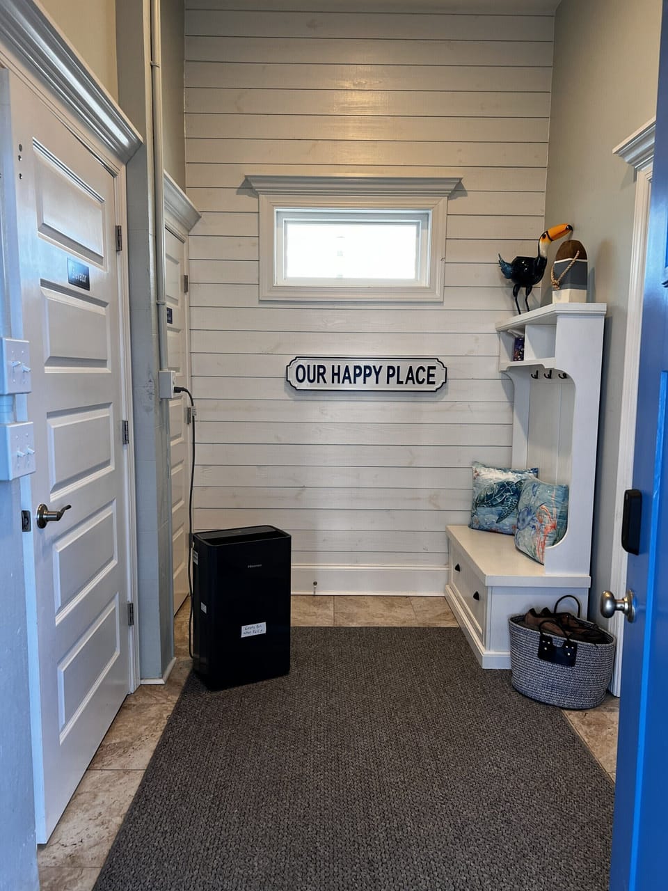Entryway with elevator and stairs on the left