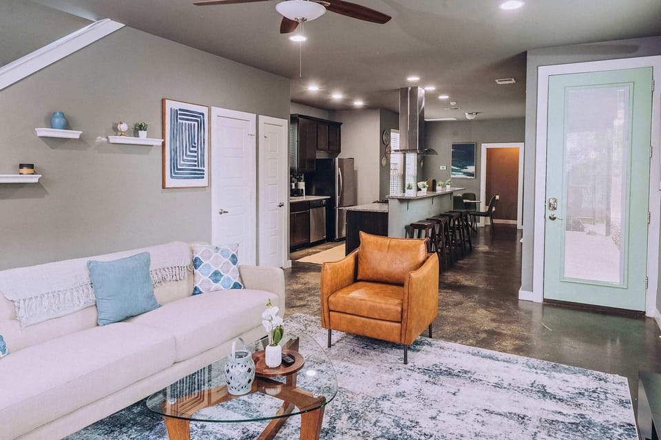 Comfy sofas, stylish vibes, and a living room that screams ‘stay a little longer.’ Perfect for chatting, chilling, or just showing off your vacation selfies.