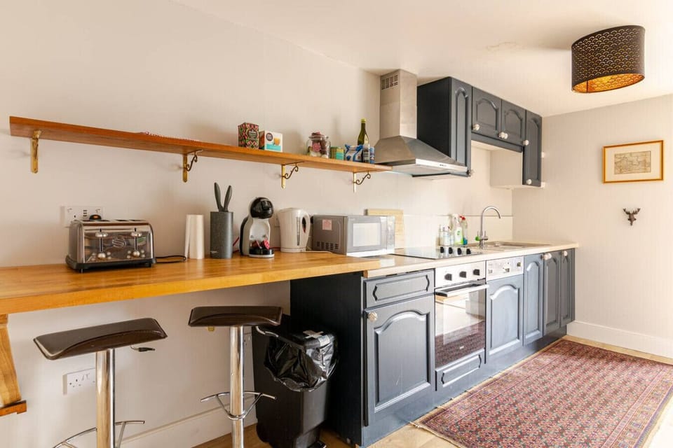 Breakfast bar seating provides a handy spot for coffee or quick meals.