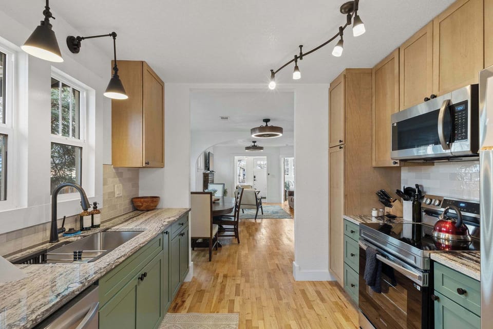 The full kitchen has stainless steel appliances, granite countertops and all of the cookware you need to create a delicious meal.