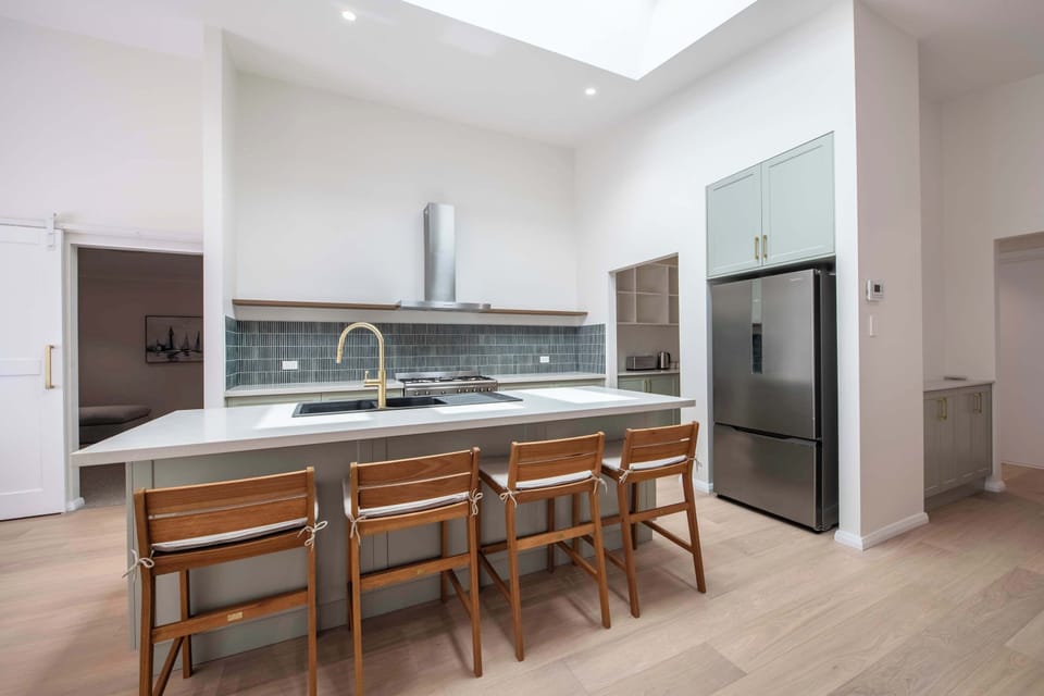 Kitchen + Coffee Machine + Breakfast Bar/Stools