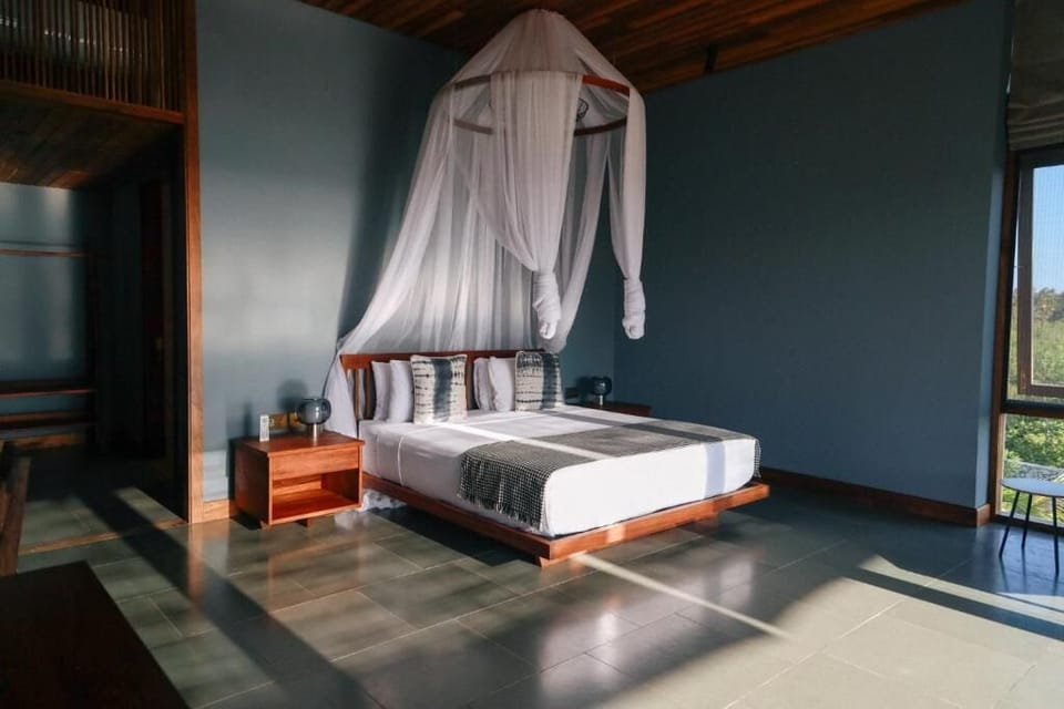 Deluxe Double Room, Balcony, Partial Ocean View | Minibar, in-room safe, WiFi (free), individually decorated
