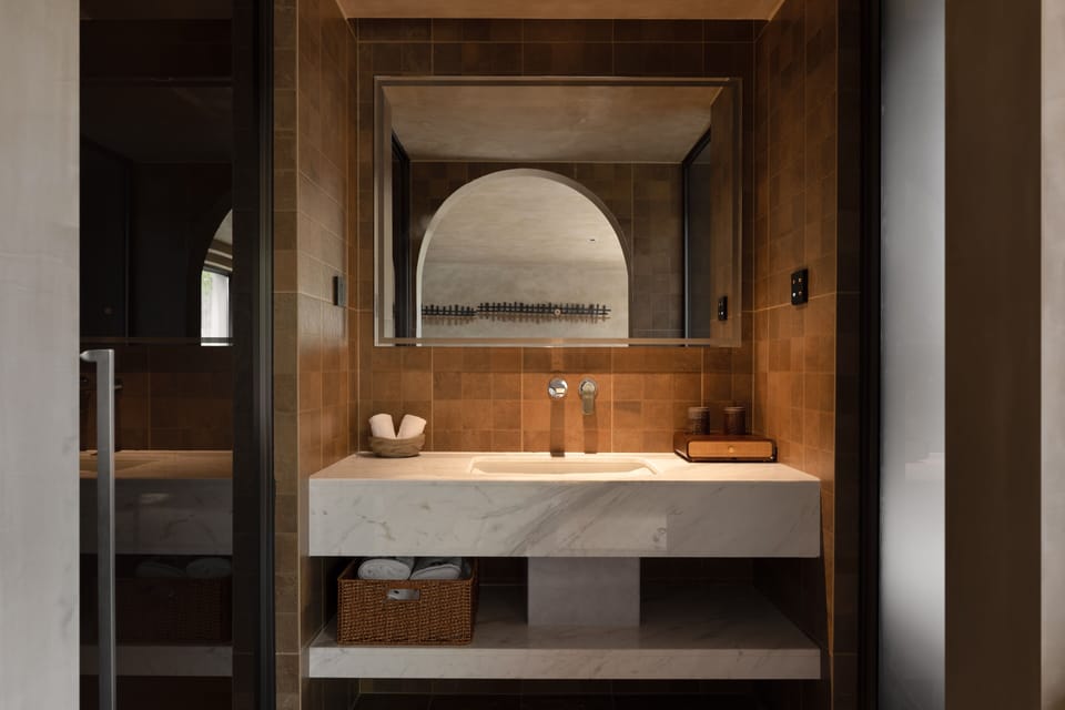 Shower, rainfall showerhead, designer toiletries, hair dryer