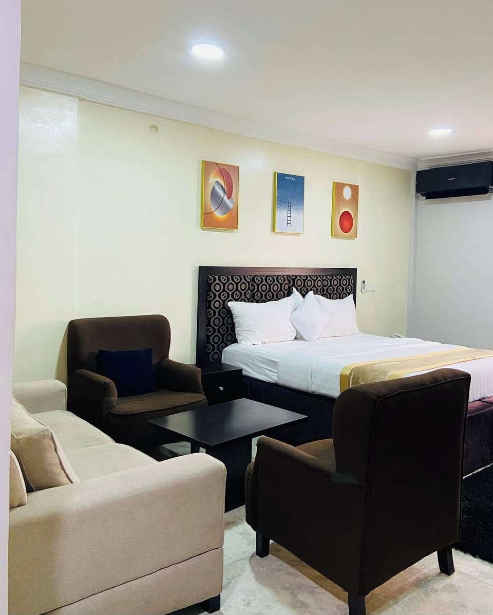 Deluxe Room, Balcony, City View | Desk, laptop workspace, blackout drapes, soundproofing