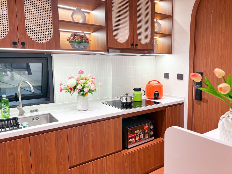Mini-fridge, microwave, cookware/dishes/utensils