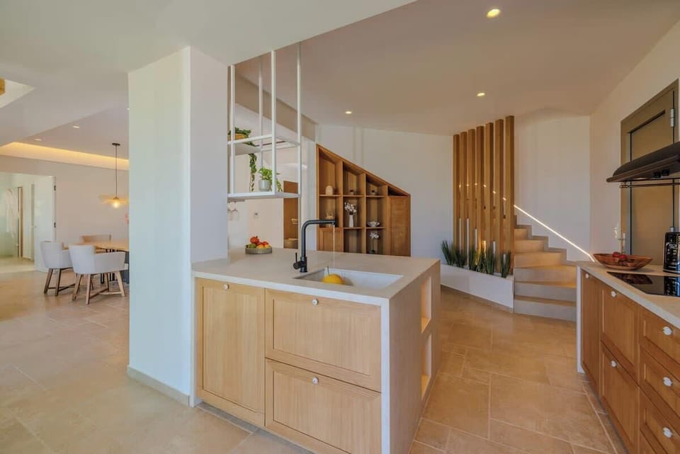 Spacious open-plan kitchen blending luxury and functionality