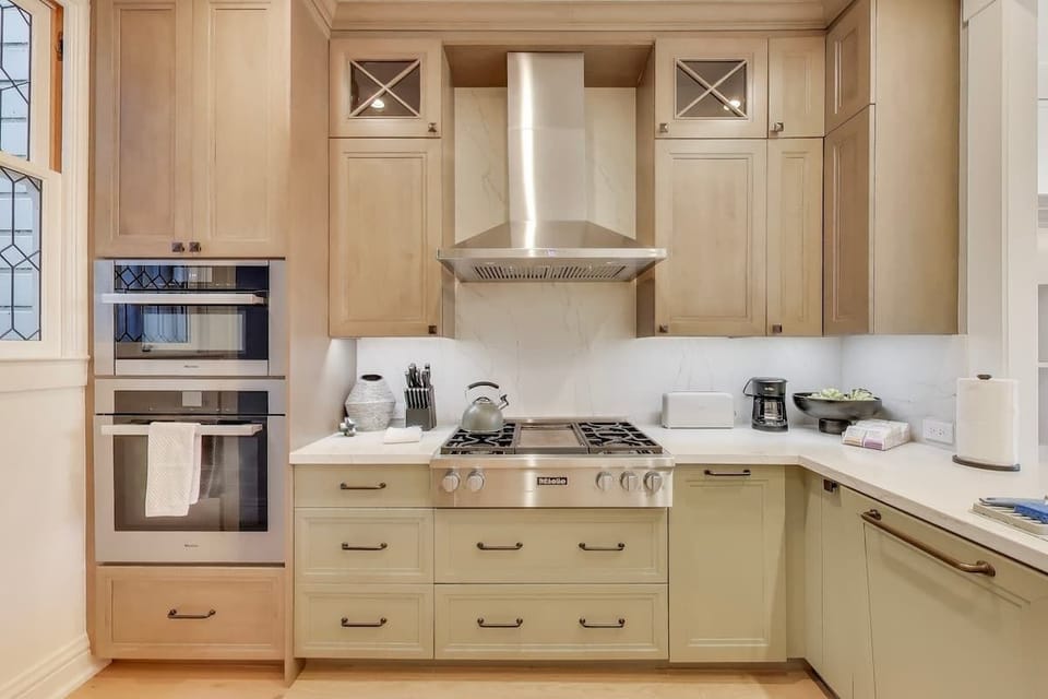 Modern grand kitchen is perfect for cooking or just hanging out and enjoying a cup of tea.