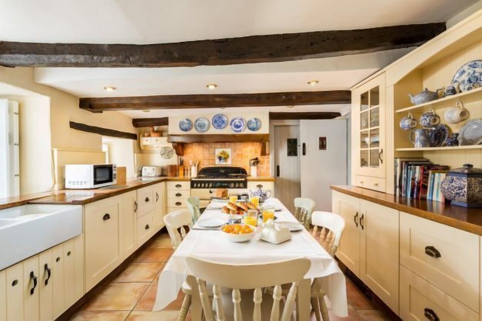 Welcoming country style kitchen with a farmhouse table.