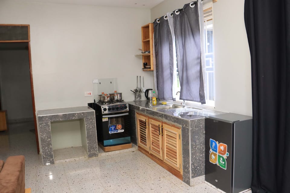 Deluxe Suite, River View | Private kitchen