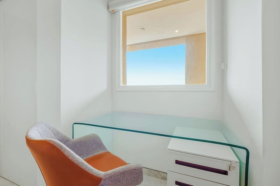 Settle in and make this your own little corner—this bright workspace is perfect for catching up on emails, planning your day, or enjoying a quiet moment by the window.