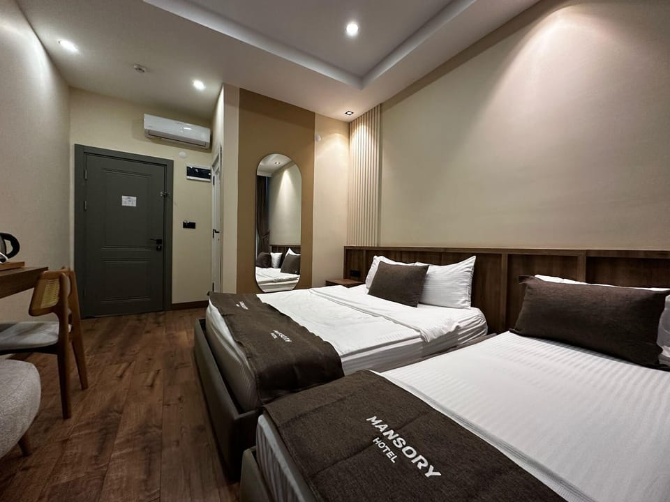 Standard Triple Room | Desk, laptop workspace, iron/ironing board, free WiFi