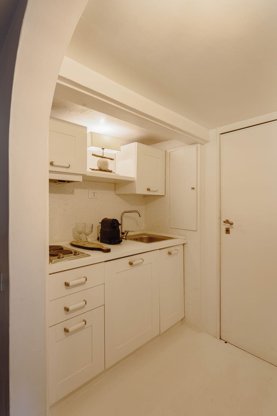 Mini-fridge, stovetop, espresso maker, coffee/tea maker