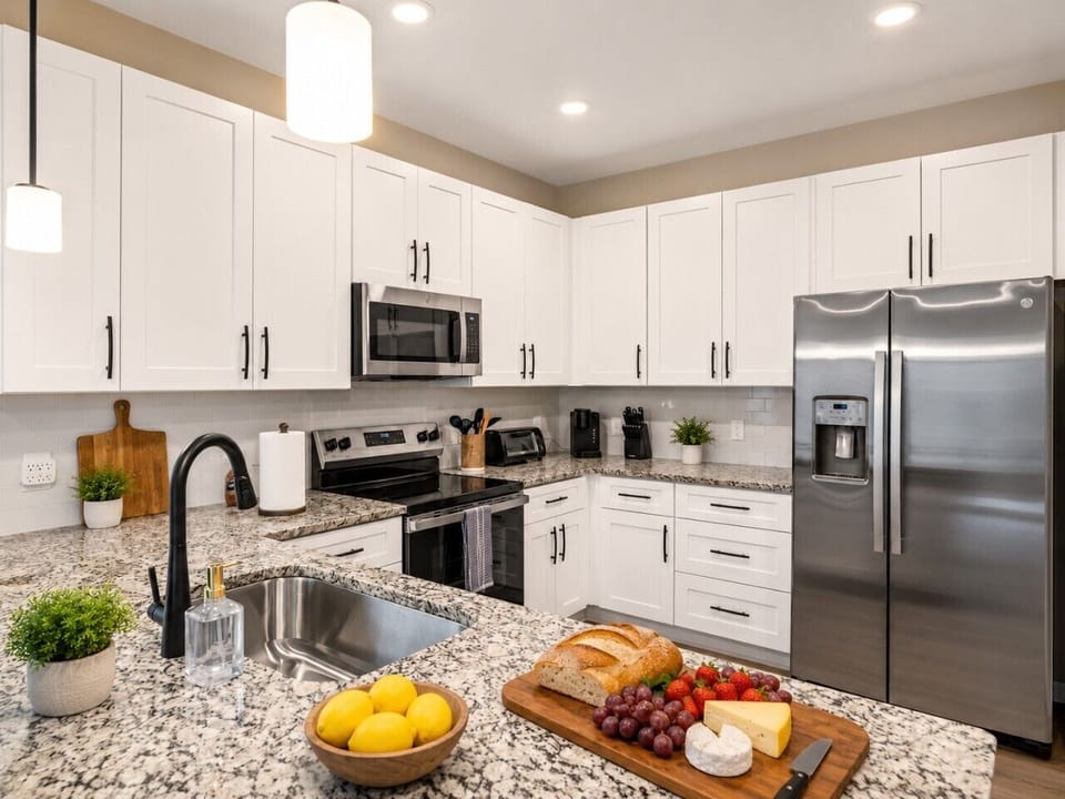 Fully equipped kitchen featuring stainless steel appliances, granite countertops, and everything you need to prepare meals during your stay.