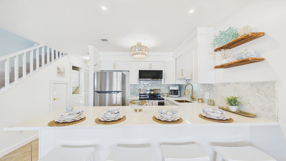 Breakfast bar seating included on the kitchen counter for 4 guests