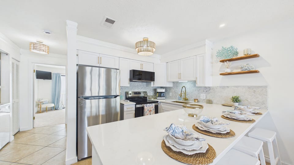 Breakfast bar seating included on the kitchen counter for 4 guests