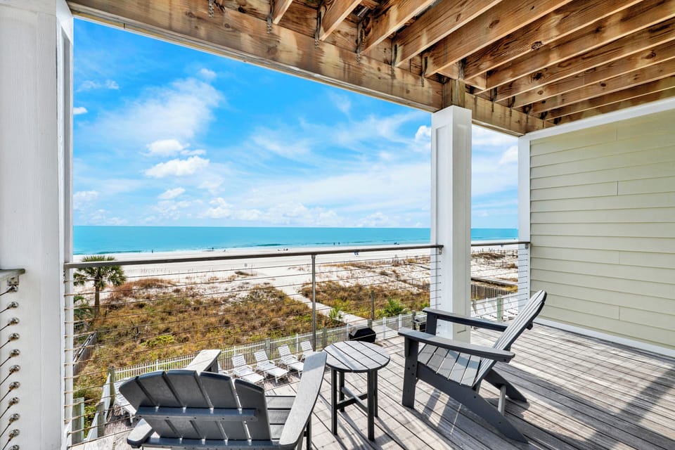 Sweeping Gulf waters stretch endlessly before this private balcony.