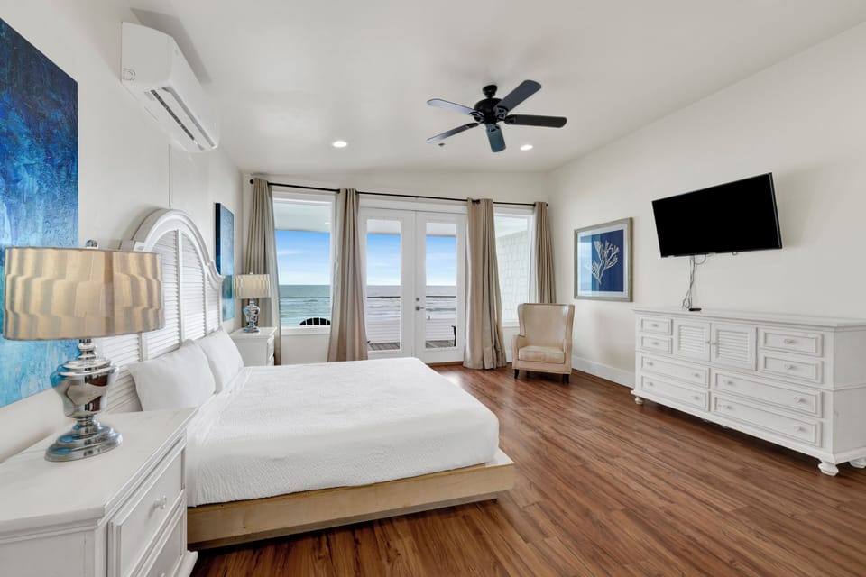 Bedroom 8 has a private balcony and bathroom, TV and King bed - sleeps 2