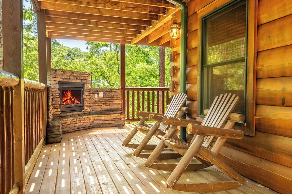 Picture yourself relaxing in one of these rustic rocking chairs on your private covered balcony, surrounded by lush forest views and warmed by your own outdoor fireplace.