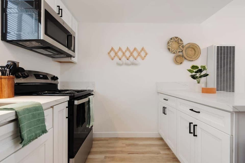 Entertain in style with sleek stone countertops and high-end appliances