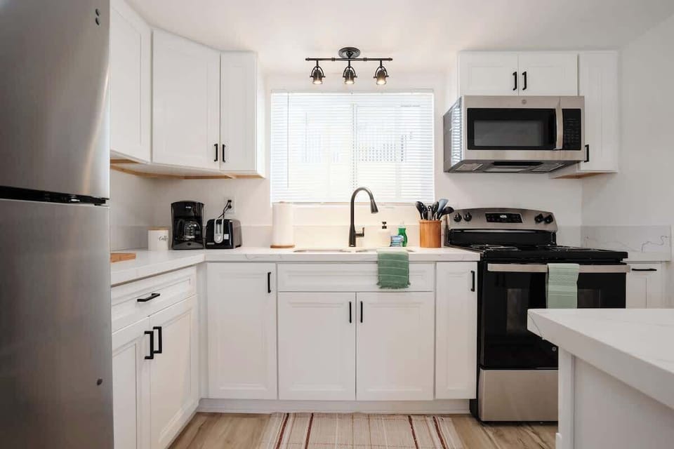 The bright kitchen comes fully equipped with all your cooking essentials