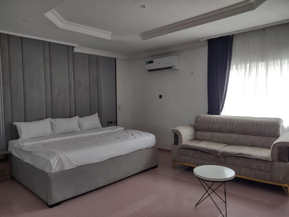 Deluxe Room, Balcony, City View | Desk, laptop workspace, blackout drapes, soundproofing
